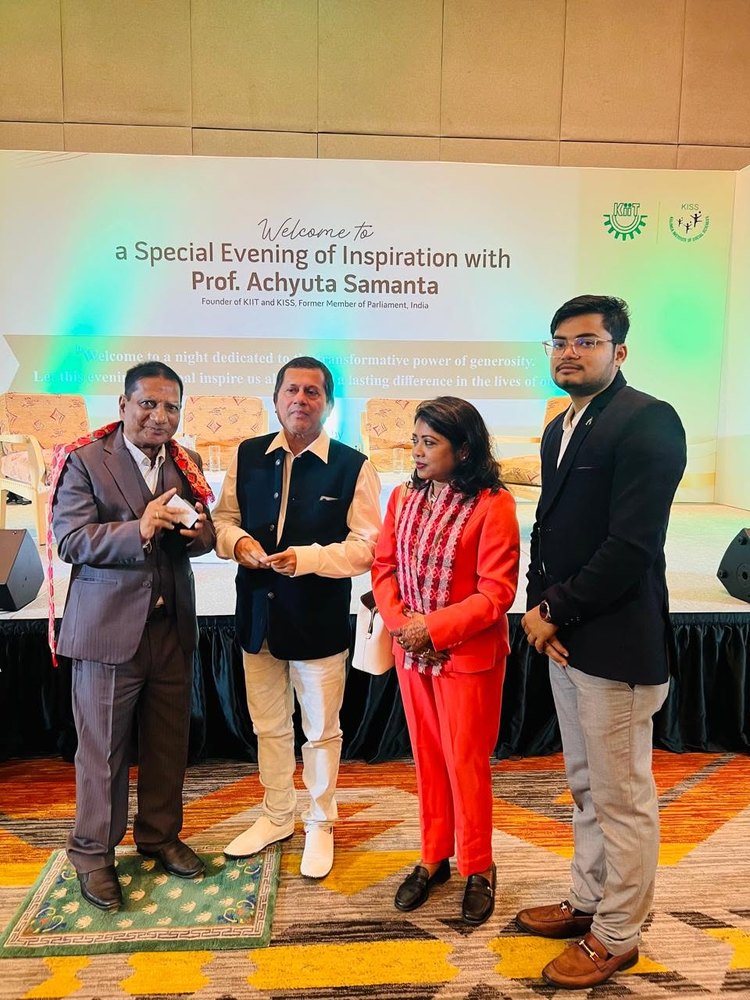 With Prof. Achyuta Samanta (Founder, KIIT & KISS) on stage