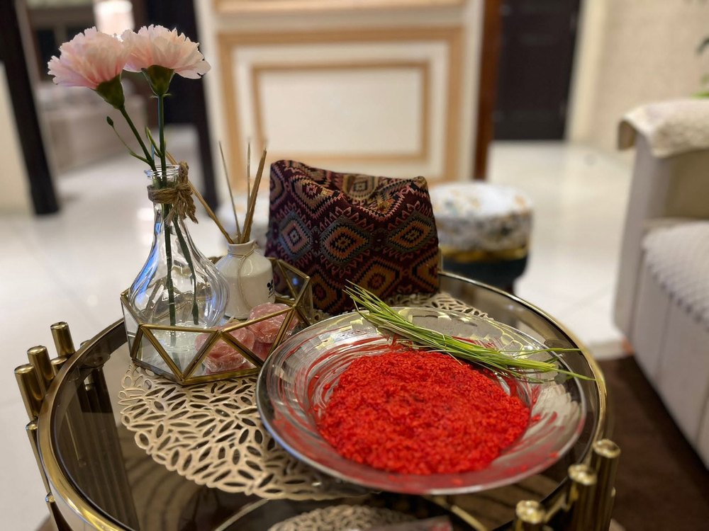 Tika thali — red rice, jamara and blessings